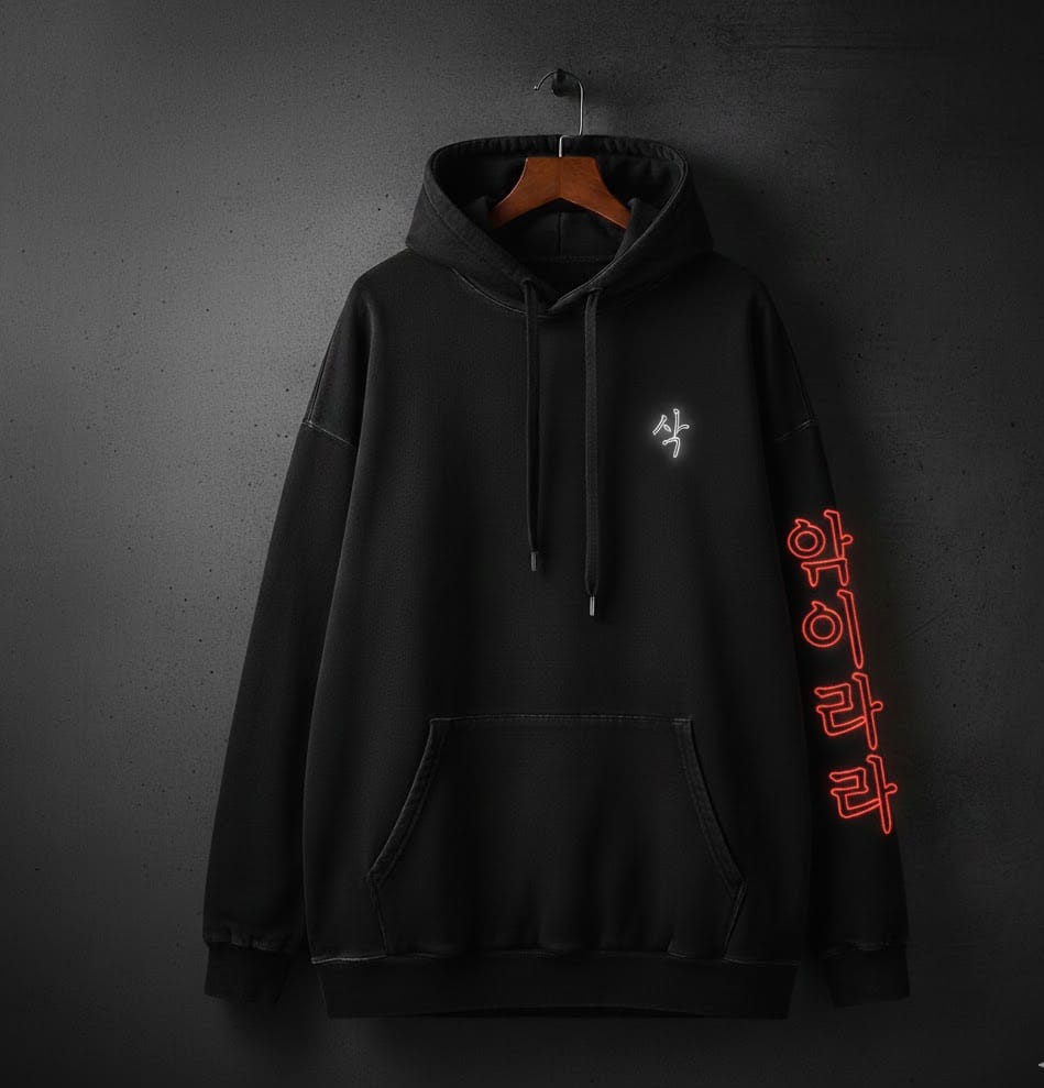 Black hoodie with red text on a dark background